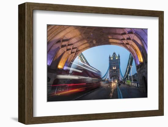 Lights on Tower Bridge over the River Thames with a typical double decker bus, London, England, Uni-Roberto Moiola-Framed Photographic Print