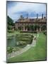 Lily Gardens and Strode House, Barrington Court, Somerset, England, United Kingdom-Chris Nicholson-Mounted Photographic Print