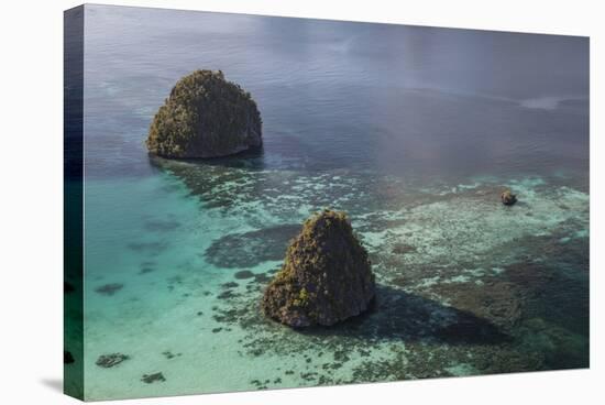 Limestone Islands Surrounded by a Coral Reef in Raja Ampat-Stocktrek Images-Stretched Canvas
