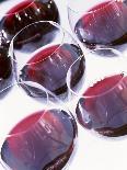 Six Glasses of Red Wine Against White Background-Linda Burgess-Photographic Print