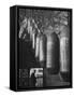 Line of 500 lbs Bombs Jiggling Along on Overhead Conveyor Hooks Abover Worker-Andreas Feininger-Framed Stretched Canvas