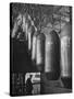 Line of 500 lbs Bombs Jiggling Along on Overhead Conveyor Hooks Abover Worker-Andreas Feininger-Stretched Canvas