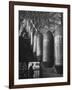 Line of 500 lbs Bombs Jiggling Along on Overhead Conveyor Hooks Abover Worker-Andreas Feininger-Framed Photographic Print