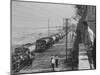 Line of Caltex Oil Trucks with Armed Escort on Road During Government Crisis-null-Mounted Photographic Print