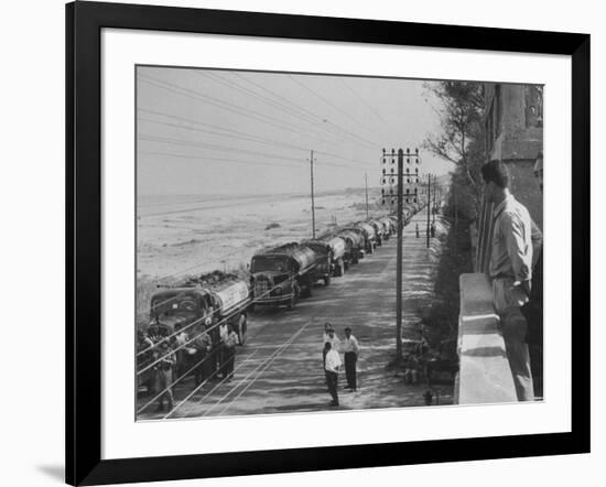 Line of Caltex Oil Trucks with Armed Escort on Road During Government Crisis-null-Framed Photographic Print