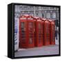 Line of Four Red Telephone Boxes at Charing Cross, London, England, United Kingdom, Europe-Roy Rainford-Framed Stretched Canvas