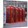 Line of Four Red Telephone Boxes at Charing Cross, London, England, United Kingdom, Europe-Roy Rainford-Mounted Photographic Print