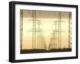 Line of High Tension Electrical Towers at Dusk-null-Framed Photographic Print