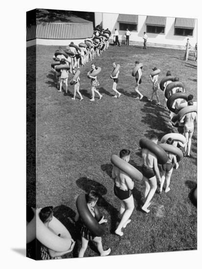 Line of People Making Snakelike Pattern as They Head for Inner Tube Floating Party on Apple River-Alfred Eisenstaedt-Stretched Canvas