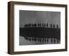 Line of Soldiers on Ridge Silhouetted Against Sky Reflected from River Beside Them-null-Framed Photographic Print