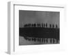 Line of Soldiers on Ridge Silhouetted Against Sky Reflected from River Beside Them-null-Framed Photographic Print