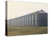 Line of Storage Bins for Corn, Unidentified Section of the Mid-West-John Zimmerman-Stretched Canvas