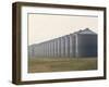Line of Storage Bins for Corn, Unidentified Section of the Mid-West-John Zimmerman-Framed Photographic Print