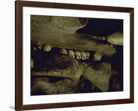 Lines of Skulls in Cave, Indonesia-Michael Brown-Framed Photographic Print