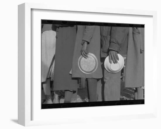 Lining up for food at mealtime in the camp for flood refugees, Forrest City, Arkansas, 1937-Walker Evans-Framed Photographic Print