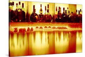 Liquor bottles and glasses, Paris, France-Panoramic Images-Stretched Canvas