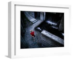 Lisa Eaton Goes for an Early Morning Run in Freeway Park - Seattle, Washington-Dan Holz-Framed Photographic Print