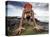 Lisa Eaton Holds a Downward Dog Yoga Pose on the Beach of Lincoln Park - West Seattle, Washington-Dan Holz-Stretched Canvas