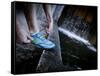 Lisa Eaton Laces Up Her Running Shoe Near a Water Feature at Freeway Park - Seattle, Washington-Dan Holz-Framed Stretched Canvas