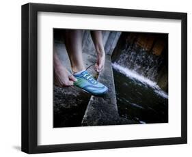 Lisa Eaton Laces Up Her Running Shoe Near a Water Feature at Freeway Park - Seattle, Washington-Dan Holz-Framed Photographic Print