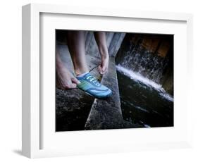 Lisa Eaton Laces Up Her Running Shoe Near a Water Feature at Freeway Park - Seattle, Washington-Dan Holz-Framed Photographic Print