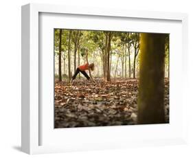 Lisa Eaton Takes Her Yoga Practice to a Rubber Tree Plantation in Chiang Dao, Thaialand-Dan Holz-Framed Photographic Print