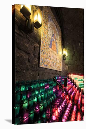 Lit Candles Within a Small Grotto, Benedictine Monastery, Barcelona, Spain-Paul Dymond-Stretched Canvas
