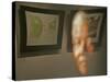 Lithograph by Nelson Mandela is Seen Reflected on a Photographic Portrait of Mandela-null-Stretched Canvas