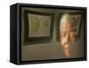 Lithograph by Nelson Mandela is Seen Reflected on a Photographic Portrait of Mandela-null-Framed Stretched Canvas