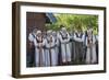 Lithuania, Curonian Spit, Nida, People Wearing Traditional Costumes Singing Outside House-null-Framed Giclee Print