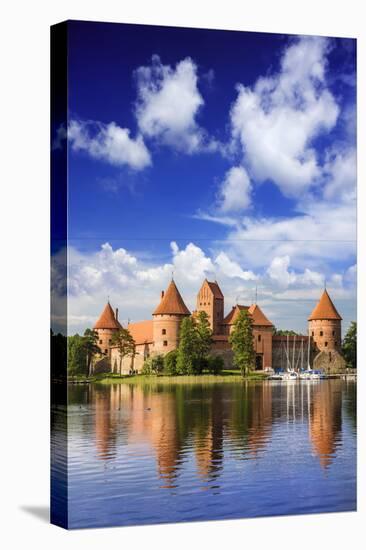 Lithuania, Vilnius. Trakai Castle reflected Galve lake in Lithuania-Miva Stock-Stretched Canvas
