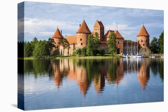 Lithuania, Vilnius. Trakai Castle reflected Galve lake in Lithuania.-Miva Stock-Stretched Canvas