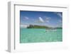 Little boat in the turquoise lagoon of Bora Bora, Society Islands, French Polynesia, Pacific-Michael Runkel-Framed Photographic Print