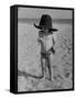 Little Boy at the Beach Wearing a Oversized Cowboy Hat Playing with a Toy Pistol-Ralph Crane-Framed Stretched Canvas
