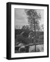 Little Boy Crossing the Bridge over the Stream at Winson Mill Farm, A War Nursery-Hans Wild-Framed Premium Photographic Print