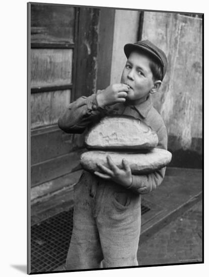 Little Boy Holding Loaves of Bread-Walter Sanders-Mounted Photographic Print