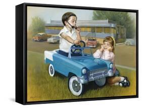 Little Boy in Toy Car with Girl Leaning on it Outside Old Fashioned Diner-David Lindsley-Framed Stretched Canvas