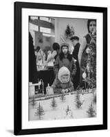 Little Boy Looking at Train Set in Moscow Department Store-James Whitmore-Framed Photographic Print