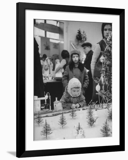 Little Boy Looking at Train Set in Moscow Department Store-James Whitmore-Framed Photographic Print