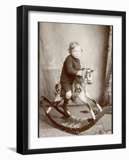 Little Boy on a Rocking Horse-null-Framed Photographic Print