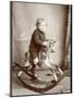 Little Boy on a Rocking Horse-null-Mounted Photographic Print