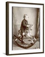 Little Boy on a Rocking Horse-null-Framed Photographic Print