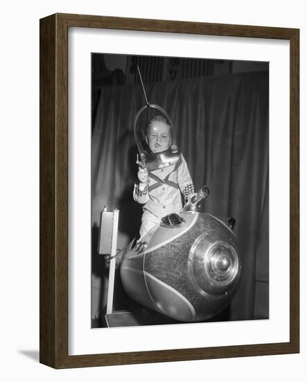 Little Boy on Spaceship Ride-null-Framed Photographic Print