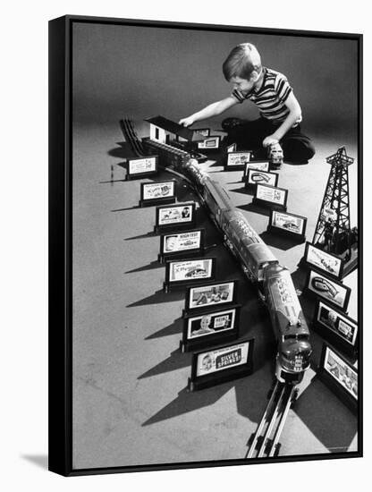 Little Boy Playing with a Toy Train and Billboard Set-Walter Sanders-Framed Stretched Canvas