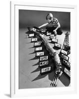 Little Boy Playing with a Toy Train and Billboard Set-Walter Sanders-Framed Photographic Print