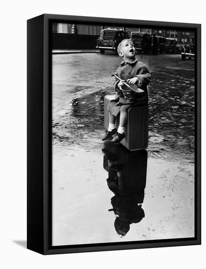 Little Boy Sits on His Suitcase Waiting for a Train to Take Him to the Seaside-null-Framed Stretched Canvas