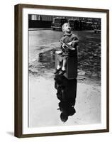 Little Boy Sits on His Suitcase Waiting for a Train to Take Him to the Seaside-null-Framed Premium Photographic Print