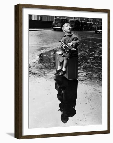 Little Boy Sits on His Suitcase Waiting for a Train to Take Him to the Seaside-null-Framed Premium Photographic Print