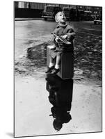 Little Boy Sits on His Suitcase Waiting for a Train to Take Him to the Seaside-null-Mounted Premium Photographic Print
