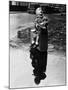 Little Boy Sits on His Suitcase Waiting for a Train to Take Him to the Seaside-null-Mounted Photographic Print